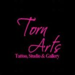 torn arts logo